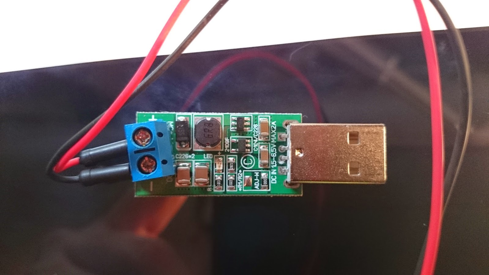 Simple USB power regulator. Takes 5v power from usb and ups the voltage to 12v. Will be used to power the top side adapter.<br />Will combine this and the TP-link adapter in one case with connectors for power, Ethernet and tether.