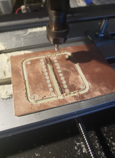 failed attempt at cutting a PCB