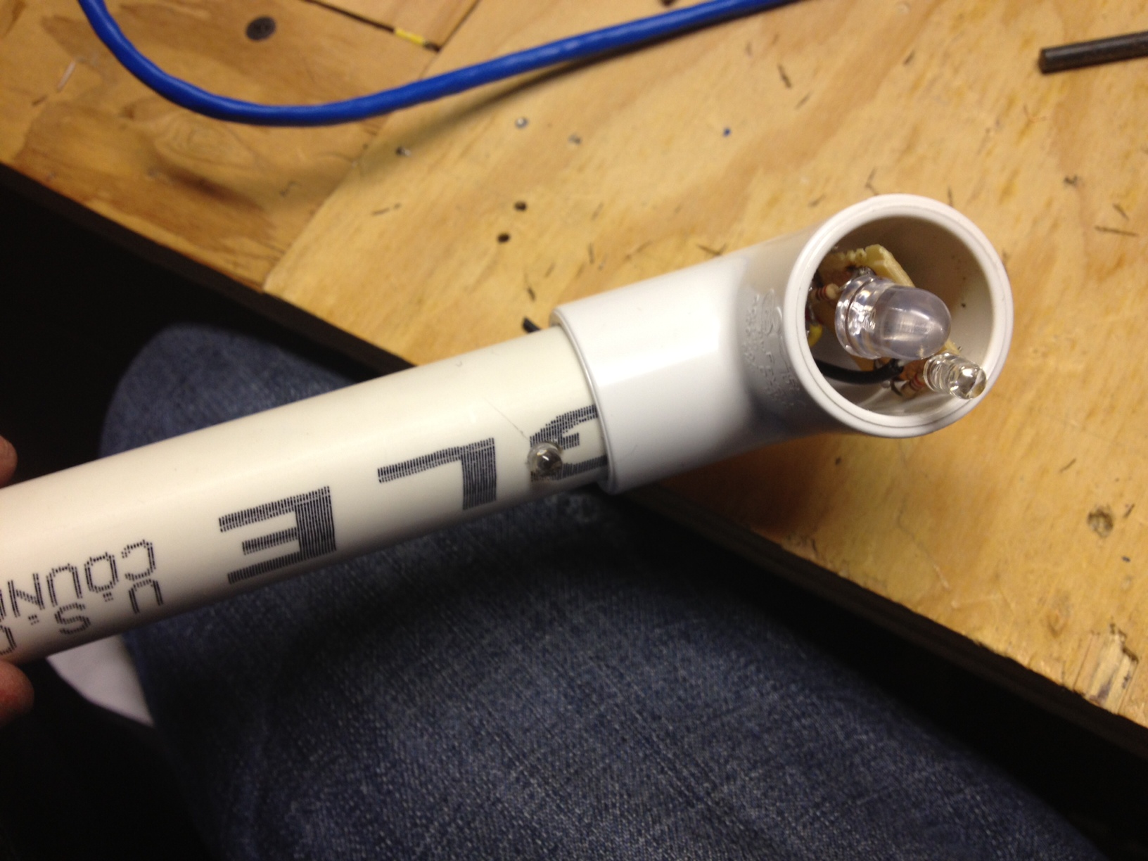 3 Leds, one jumbo and one normal on the 90* bend, 1 poked out the side of the pipe