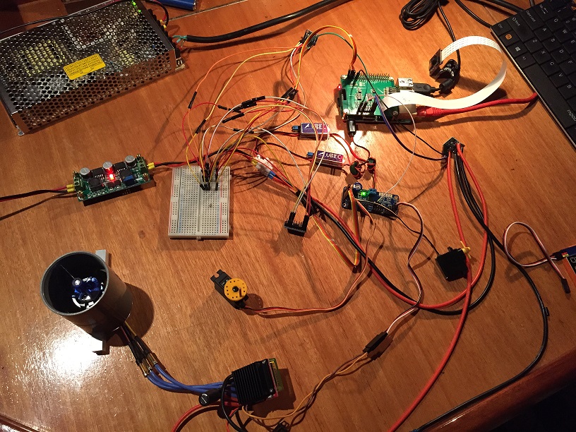 This is what you see on the photo below:<br />- Raspberry PI B+<br />- ADC Pi Plus (MCP3424 8x 18bit ADC)<br />- Heading sensor (MPU9150)<br />- Temp/Depth sensor (MS5803-14a) <br />- AttoPilot Voltage and Current Sense Breakout - 180A<br />- 2x UBEC 3A -> 5v for PI and 5v for servoboard.<br />- Adafruit 16-Channel 12-bit PWM/Servo Driver<br />- NTM Prop Drive Series 28-30A 750kv / 140w<br />- HobbyKing Brushless Car ESC 30A w/ Reverse<br />- DC/DC Converter Regulator Step up &amp; Step down 2 in 1 (24v->12v 2A, power for Ubec's)<br />- Powersupply 24V / 200w<br />- 2 Old Dymond servo's ;)<br />- PiCamera<br />- Logitech C525 webcam<br /><br />What you don't see, on the photo ;)<br />- Laptop with Chrome<br />- Xbox one controller<br />- Wifi AP / Router
